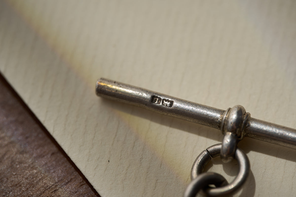 Open Curb Single Albert with Colliery Cricket Cup Fob, Edwardian