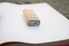 Cartier lighter base plate, alternate angle showing Cartier Paris maker's mark and serial number