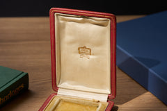 Cartier yellow guilloché enamel étui c.1920, Cartier box open, front view