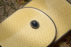 Cartier yellow guilloché enamel étui c.1920, enamel flap lying over the body