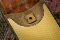 Cartier yellow guilloché enamel étui c.1920, gilt strike plate in the suede tab, macro