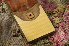 Cartier yellow guilloché enamel étui c.1920, gilt strike plate in the suede tab