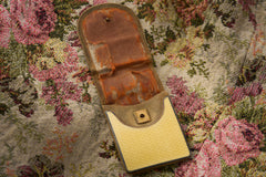 Cartier yellow guilloché enamel étui c.1920, étui open showing the rust-red silk lining