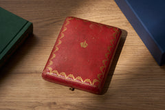 Cartier yellow guilloché enamel étui c.1920, the fitted red leather Cartier box closed, crown on the lid