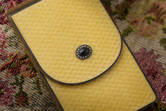Cartier yellow guilloché enamel étui c.1920, étui three-quarter view showing the enamel flap and clasp