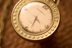 Gold Coin-Form Pendant Watch, 'Time Is Money' Bezel, c.1960, detail view 4