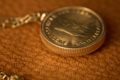 Gold Coin-Form Pendant Watch, 'Time Is Money' Bezel, c.1960, detail view 6