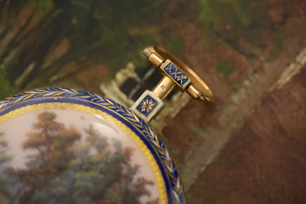 Eagle's head on the enamelled pendant